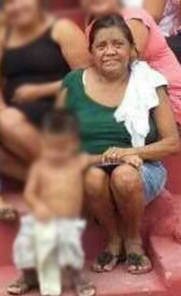 Joana Dar’c Magalhães Guimarães, 56, foi morta dentro de sua casa enquanto apartava uma briga entre os filhos