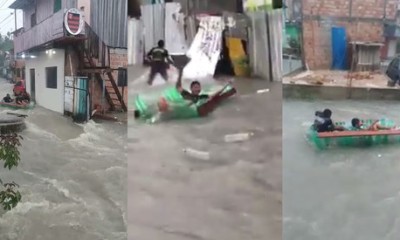 Jovens praticam esporte radical nas águas da chuva que caiu em Manaus