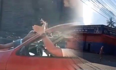 Vídeo : Mulher flagra marido saindo do motel com novinha e se agarra ao capu do carro em Manaus!