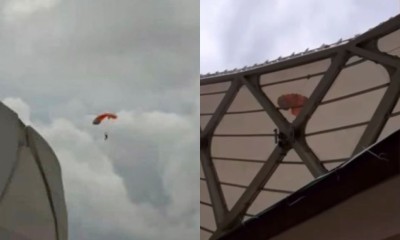 Cunhatã pousa de paraquedas no teto da Arena da Amazônia