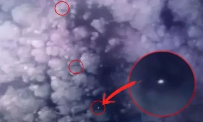 OVNIs escondidos nas nuvens e flutuando sobre a atmosfera da Terra. | Reprodução/ Twitter