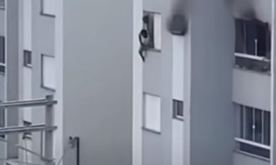 Vídeo mostra momento em que avós pulam pela janela após garoto incendiar apartamento após briga por causa do uso de celular!
